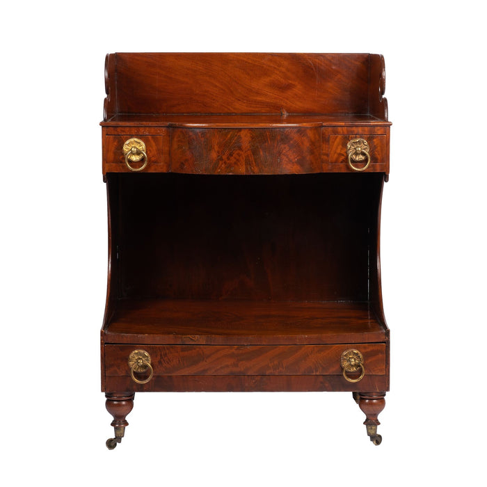 American mahogany demilune dressing stand on brass castors (1830)
