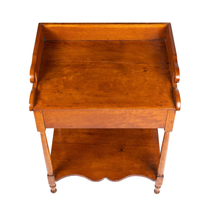 Philadelphia cherry wood dressing stand with splash on a conforming apron (1810-20)